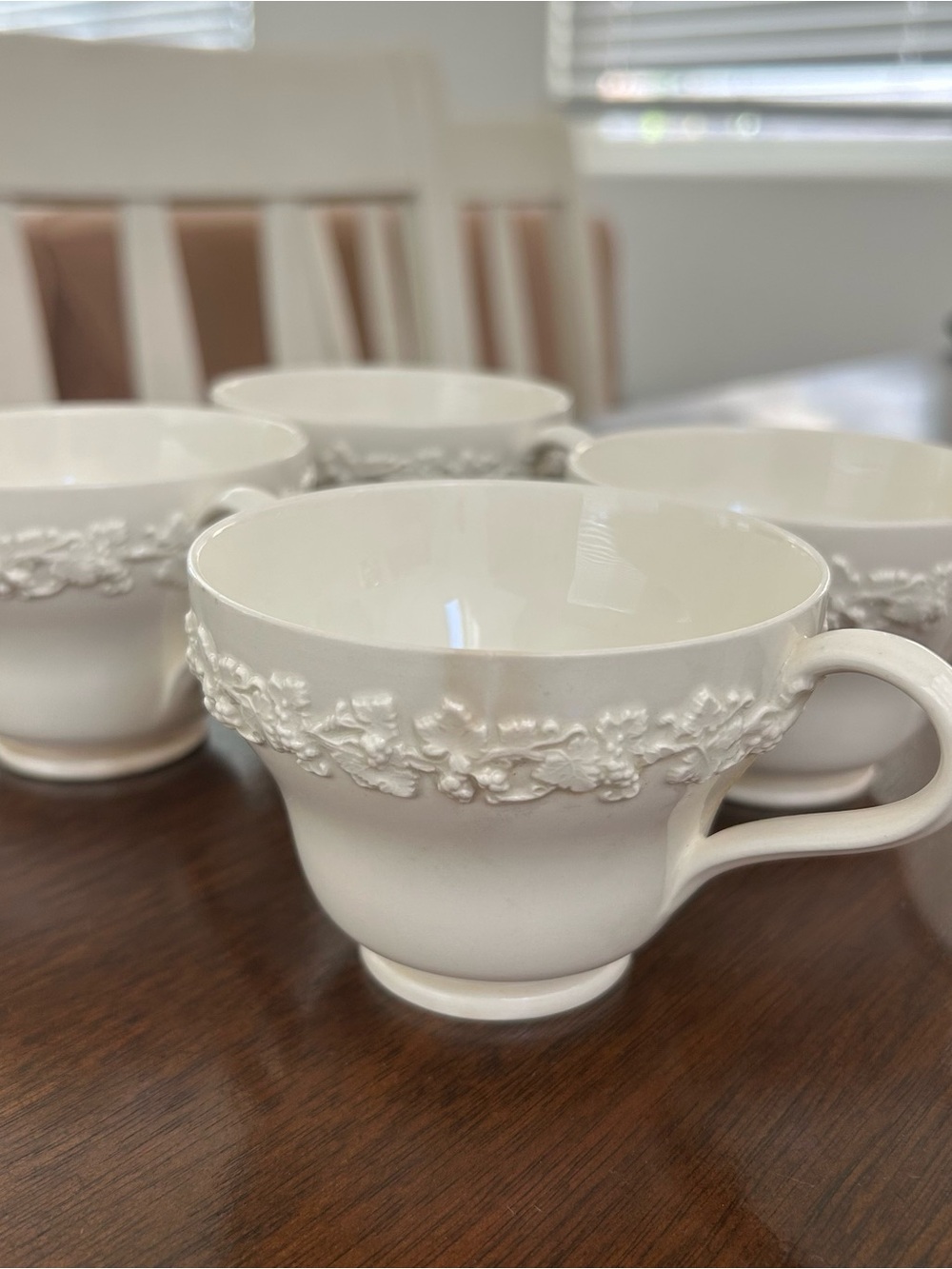 Lot of 4 vintage Wedgwood Queensware cream-on-cream teacups, made in England
